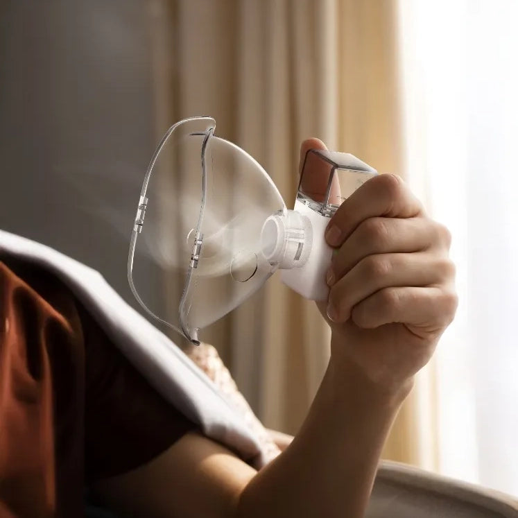 جهاز Green Lion Mini Nebulizer للاستنشاق المحمول بتقنية Mesh والقابل للشحن – أبيض